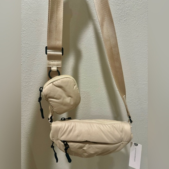 Anthropologie Accessories - Anthropologie Half Moon Puffer Bag Shoulder Crossbody NWT. Cream /Nylon